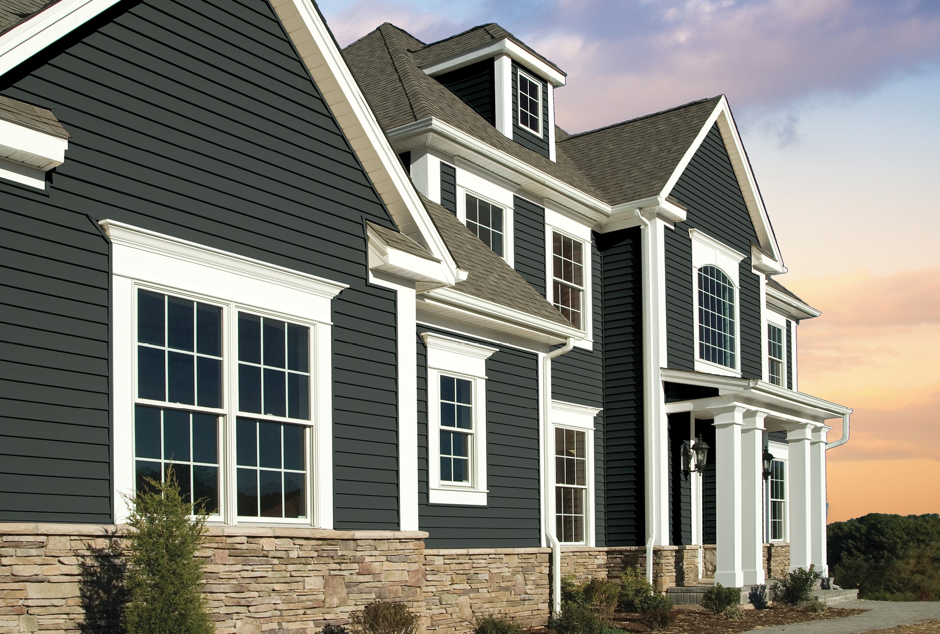 illustration of a large home with new siding