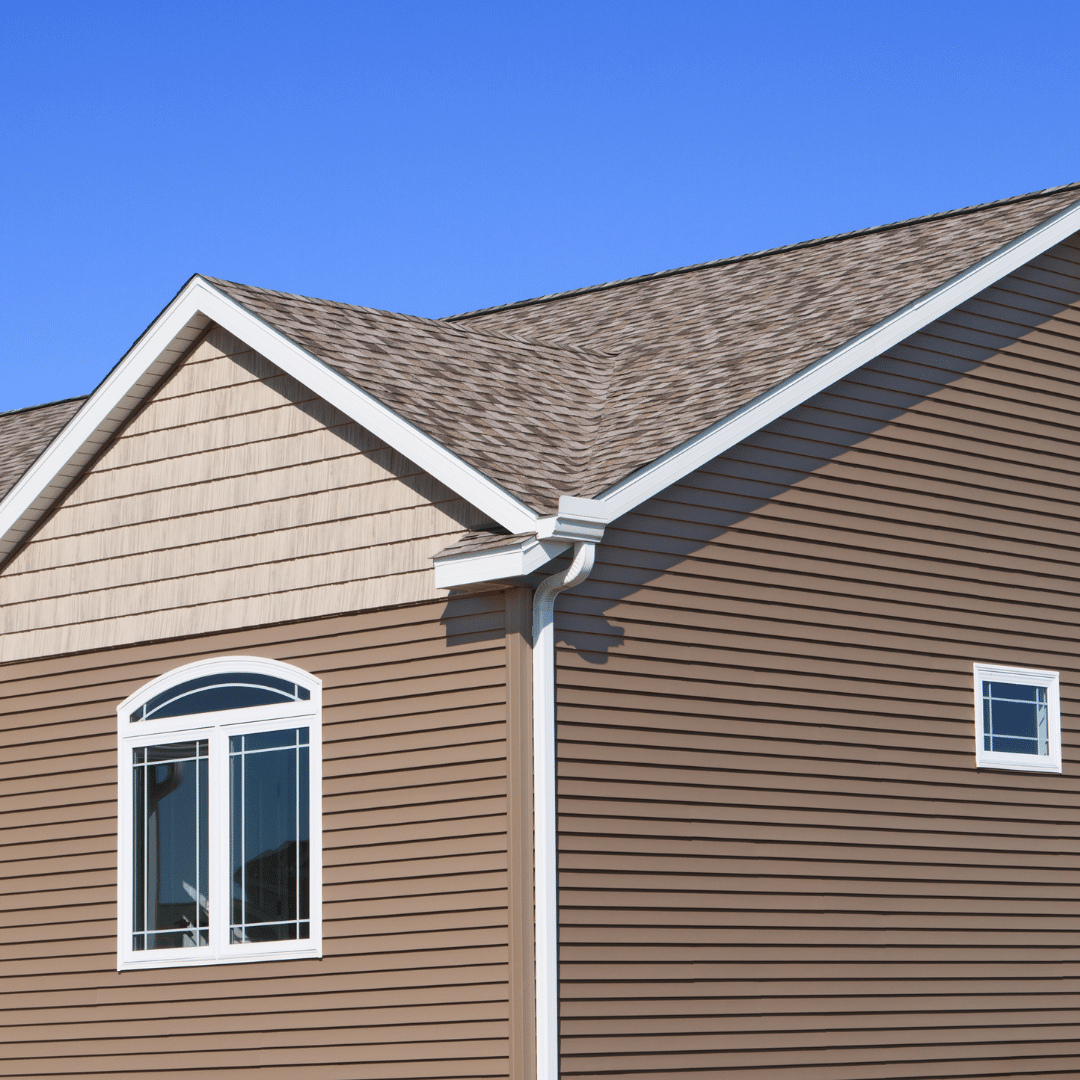 cropped view of home with vinyl siding