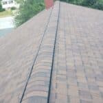 finished asphalt shingle roof peak
