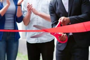 Ribbon Cut Ceremony Outdoors Building New Business