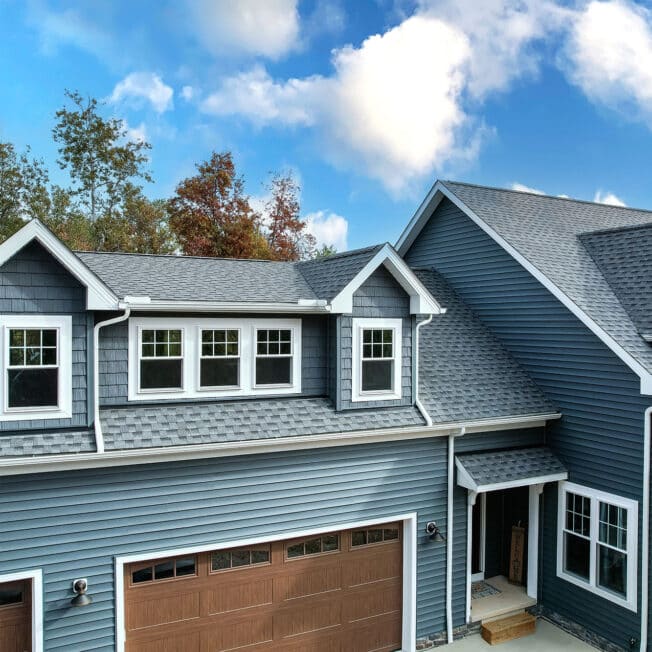 white aspect double hung and picture windows